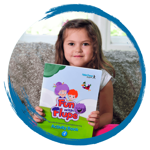 girl holds fun with flupe activity book